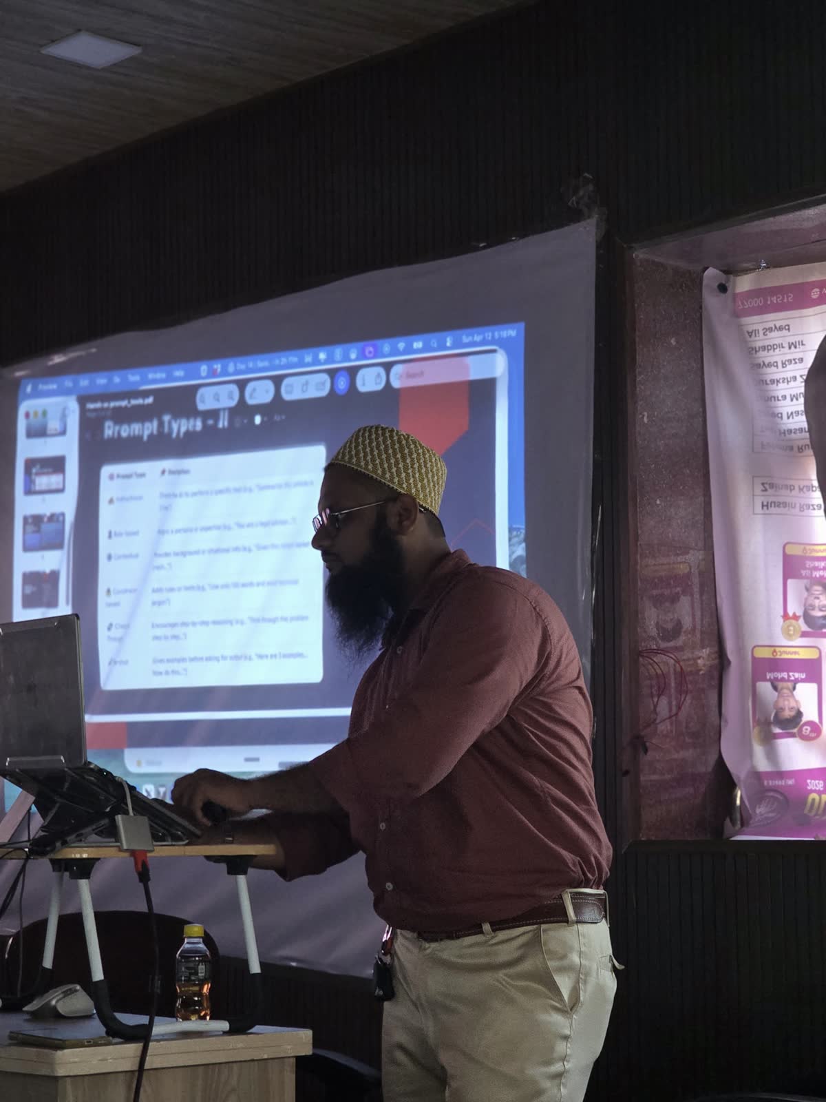 A trainer working through a live demo at Arambagh