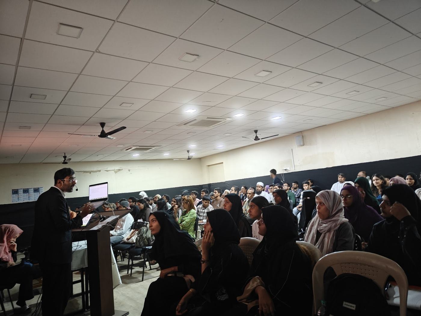 Ali speaking to the hall on day one