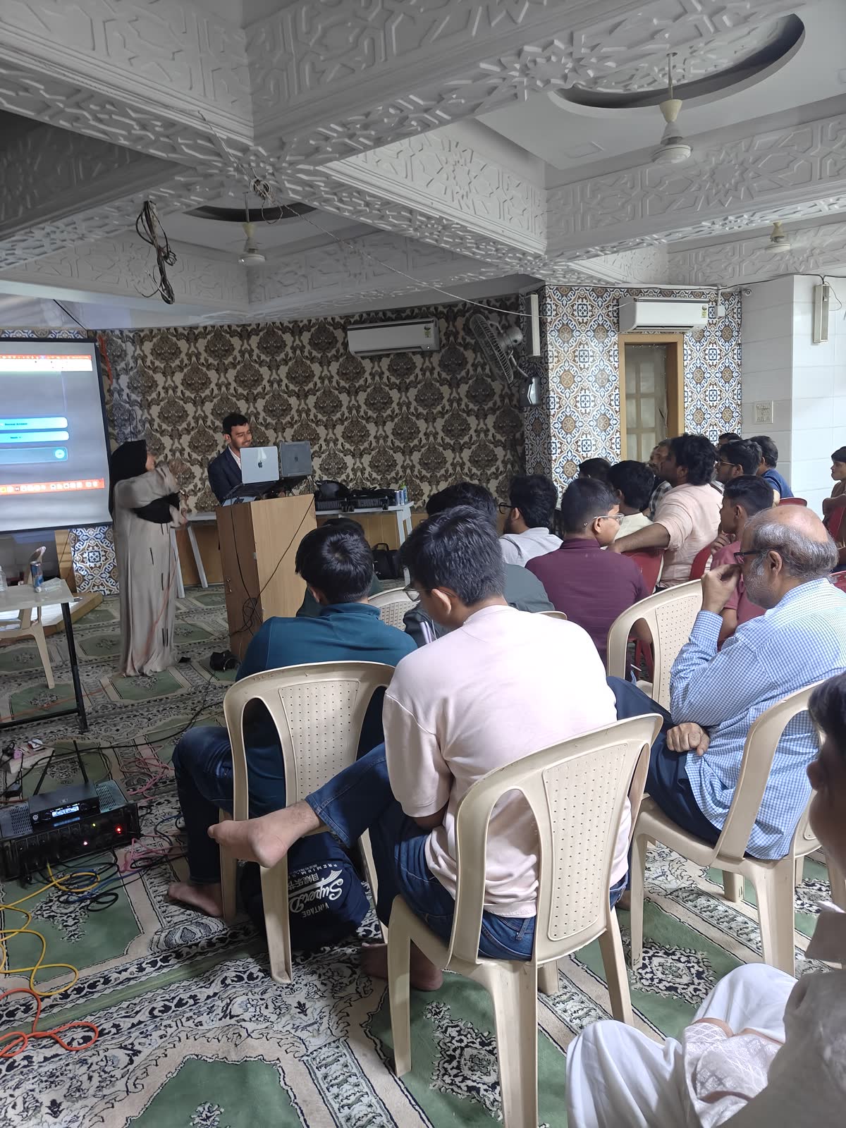 The Mira Road audience following along