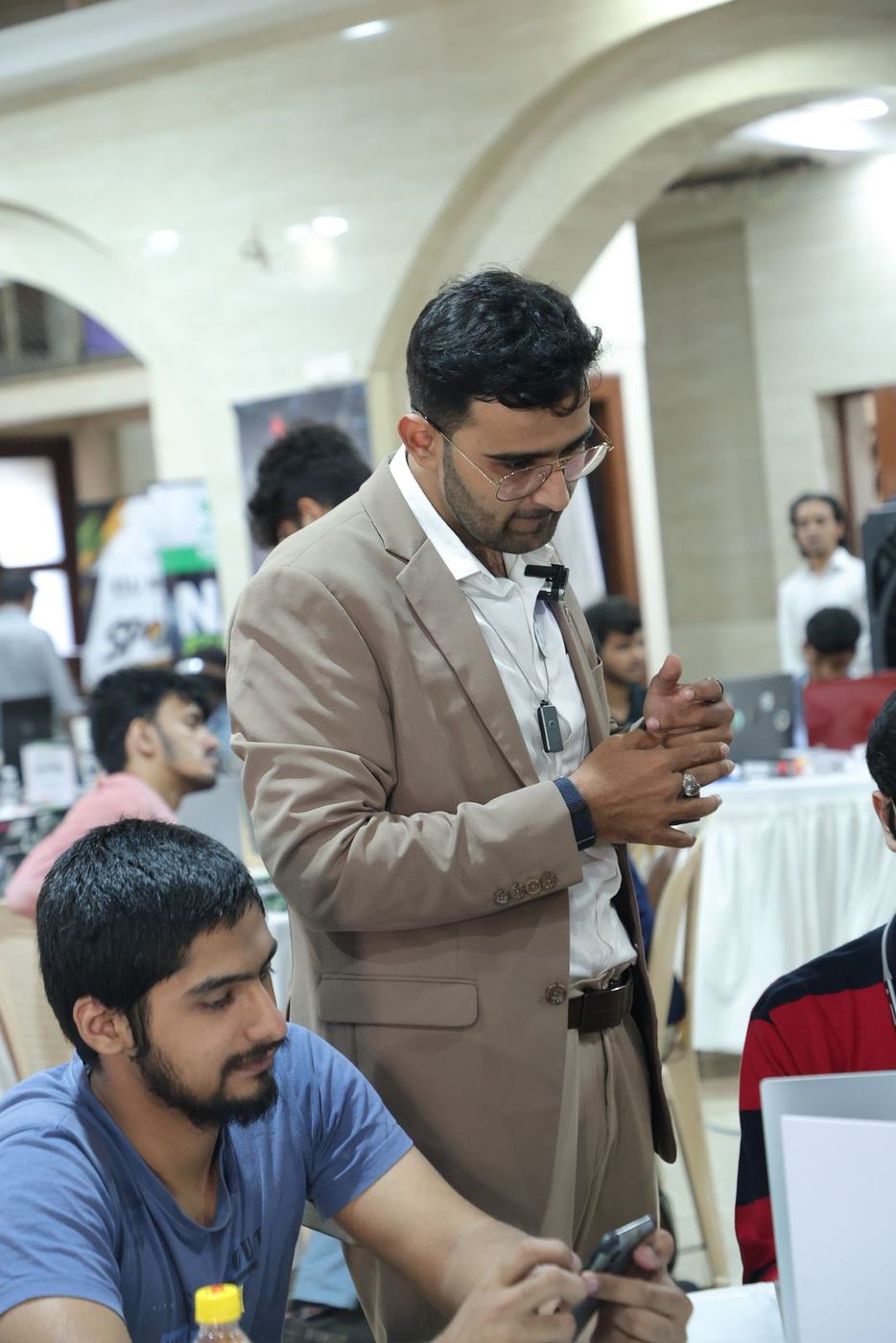 Ali judging a project